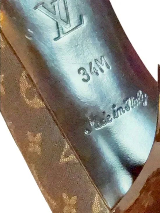 Louis Vuitton Brown
Mini Lin Signature Monogram Pumps - Picture 5 of 5